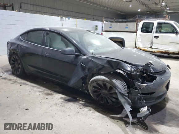 2022 Tesla Model 3 Performance with VIN 5YJ3E1EC7NF104209, listed as a Copart auction lot 86266344 with 77,335 mi miles and Salvage Title. Bid and sale history available at DreamBid. Image 4.
