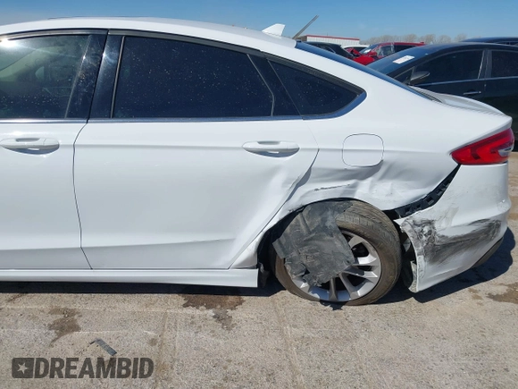 2020 Ford Fusion SE with VIN 3FA6P0HD7LR202728, listed as a IAAI auction lot 41808029 with 101,369 mi miles and . Bid and sale history available at carsss.com. Image 6.
