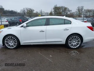 2014 Buick LaCrosse Premium II with VIN 1G4GF5G39EF305460, listed as a IAAI auction lot 41951229 with 127,188 mi miles and . Bid and sale history available at DreamBid. Image 14.