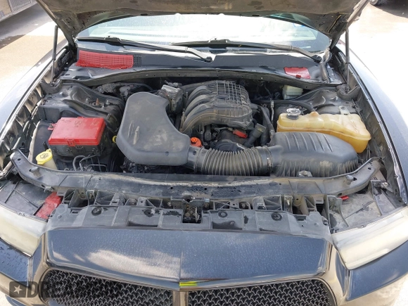2013 Dodge Charger SE with VIN 2C3CDXBG5DH535058, listed as a IAAI auction lot 42101566 with 205,790 mi miles and . Bid and sale history available at DreamBid. Image 10.