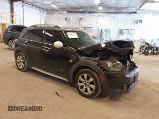 2019 MINI Countryman Cooper with VIN WMZYV5C53K3E05041, listed as a IAAI auction lot 41684566 with 65,237 mi miles. Bid and sale history available at carsss.com. Image 1.