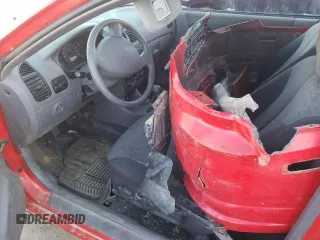 2005 Hyundai Accent GLS with VIN KMHCG35C65U348300, listed as a Copart auction lot 77847614 with 141,102 mi miles and Salvage Title. Bid and sale history available at carsss.com. Image 7.