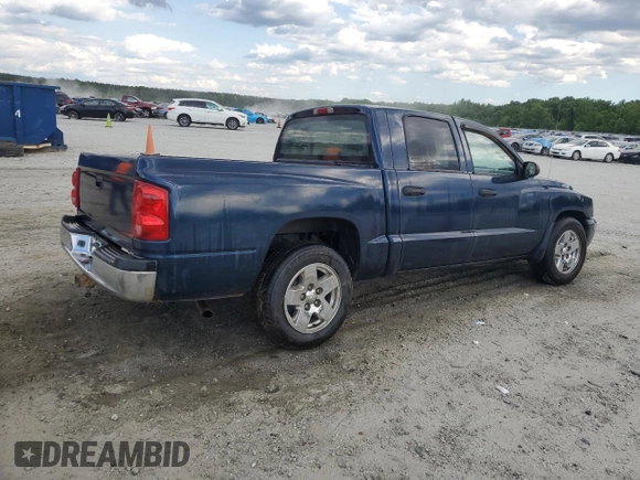 2005 Dodge Dakota SLT with VIN 1D7HE48NX5S308595, listed as a Copart auction lot 56713434 with 257,419 mi miles and Salvage Title. Bid and sale history available at DreamBid. Image 3.