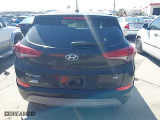 2017 Hyundai Tucson Value with VIN KM8J33A28HU302472, listed as a IAAI auction lot 41717598 with 126,438 mi miles. Bid and sale history available at carsss.com. Image 16.