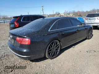 2014 Audi A8 4.0T с VIN WAUR2AFDXEN005361, выставлен на аукционе Copart как лот 46828285 с пробегом 106 984 миль миль и Списание • Salvage title. История ставок и продаж доступна на DreamBid. Изображение 3.