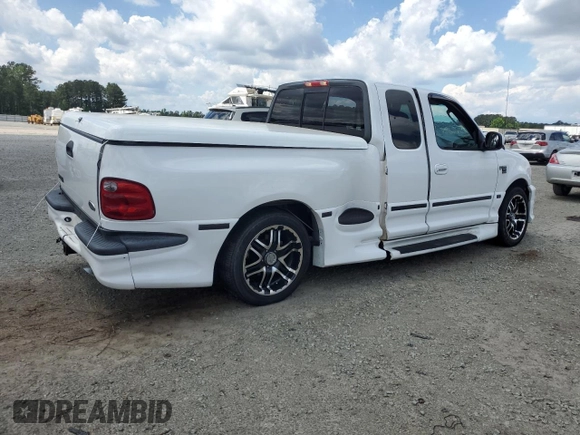 2003 Ford F-150 XL with VIN 2FTRX07L53CA21913, listed as a Copart auction lot 55483045 with 172,637 mi miles and Salvage title. Bid and sale history available at DreamBid. Image 3.