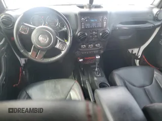 2017 Jeep Wrangler Unlimited Rubicon Recon with VIN 1C4BJWFG7HL696895, listed as a Copart auction lot 57409625 with 50,802 mi miles and Salvage title. Bid and sale history available at DreamBid. Image 8.