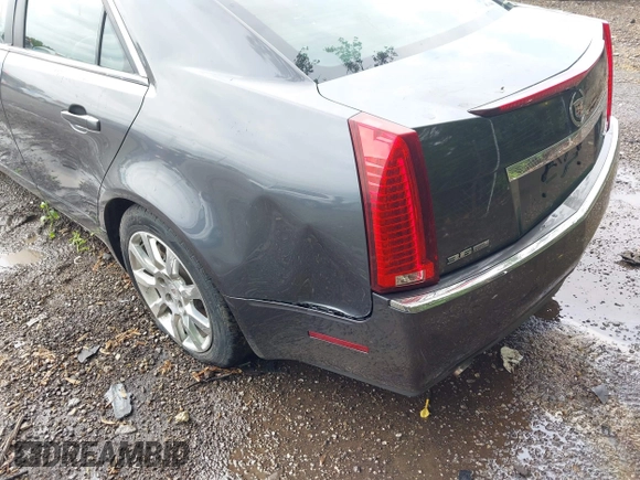 2009 Cadillac CTS AWD z VIN 1G6DT57V790133622, wystawiony jako IAAI lot #42272929 z przebiegiem 124 695 mil mil oraz . Historia ofert i sprzedaży dostępna na DreamBid. Obrazek 12.