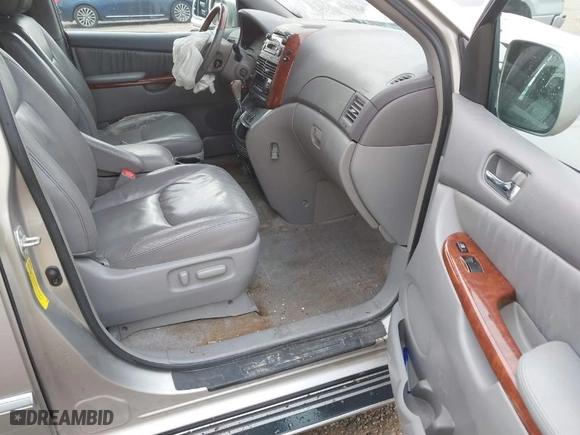 2005 Toyota Sienna XLE with VIN 5TDZA22CX5S384042, listed as a IAAI auction lot 40657985 with 165,572 mi miles. Bid and sale history available at carsss.com. Image 5.