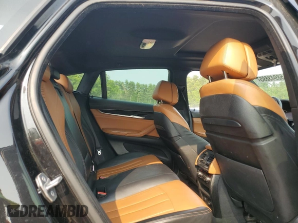 2016 BMW X6 xDrive35i z VIN 5UXKU2C51G0N80206, wystawiony jako Copart lot #58943895 z przebiegiem 74 870 mil mil oraz Szkoda całkowita • Salvage title. Historia ofert i sprzedaży dostępna na DreamBid. Obrazek 11.