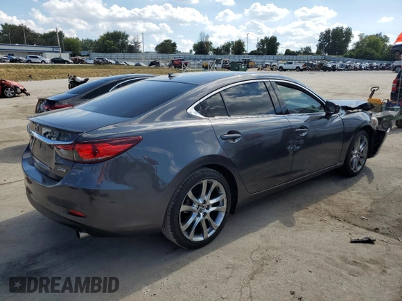 2014 Mazda 6 i Grand Touring с VIN JM1GJ1W67E1135264, выставлен на аукционе Copart как лот 70587624 с пробегом 86 926 миль миль и Списание • Salvage title. История ставок и продаж доступна на DreamBid. Изображение 3.