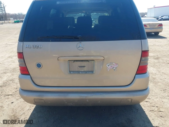 2001 Mercedes-Benz M-Class with VIN 4JGAB54E91A251754, listed as a IAAI auction lot 41784883 with 148,288 mi miles. Bid and sale history available at carsss.com. Image 6.