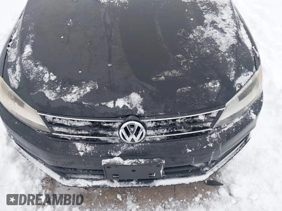2015 Volkswagen Jetta SE z VIN 3VWD17AJ8FM321933, wystawiony jako IAAI lot #41177805 z przebiegiem 125 987 mil mil oraz . Historia ofert i sprzedaży dostępna na DreamBid. Obrazek 6.