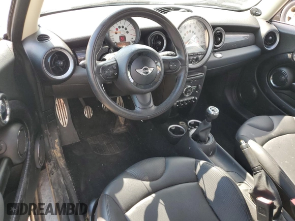 2012 MINI Hardtop S with VIN WMWSV3C53CTY25517, listed as a Copart auction lot 62315535 with 50,680 mi miles and Salvage title. Bid and sale history available at DreamBid. Image 8.