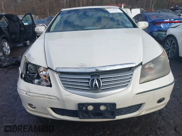 2006 Acura RL z VIN JH4KB16546C002058, wystawiony jako IAAI lot #41286711 z przebiegiem 297 234 mil mil oraz . Historia ofert i sprzedaży dostępna na DreamBid. Obrazek 12.