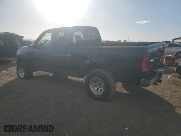 2003 Ford F-150 XL with VIN 1FTRX17L13NA95202, listed as a Copart auction lot 87766385 with 124,961 mi miles and Salvage Title. Bid and sale history available at carsss.com. Image 2.