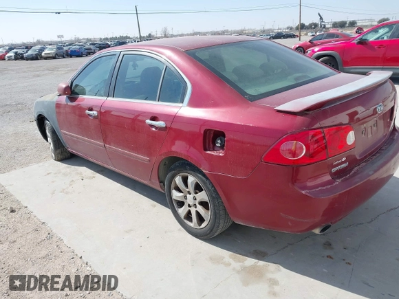 2007 Kia Optima EX with VIN KNAGE124375088526, listed as a IAAI auction lot 41526854 with 285,908 mi miles. Bid and sale history available at carsss.com. Image 3.