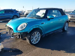 2016 MINI Convertible z VIN WMWWG5C50G3C19656, wystawiony jako IAAI lot #41429611 z przebiegiem 60 873 mil mil oraz . Historia ofert i sprzedaży dostępna na DreamBid. Obrazek 18.