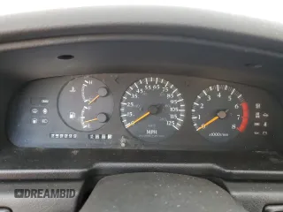 1992 Nissan Maxima z VIN JN1HJ01F1NT007180, wystawiony jako Copart lot #71271334 z przebiegiem 252 299 mil mil oraz Tytuł czysty. Historia ofert i sprzedaży dostępna na DreamBid. Obrazek 9.