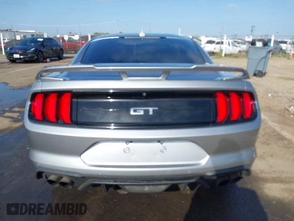 2021 Ford Mustang GT z VIN 1FA6P8CF3M5117977, wystawiony jako IAAI lot #42100989 z przebiegiem 13 557 mil mil oraz . Historia ofert i sprzedaży dostępna na DreamBid. Obrazek 17.