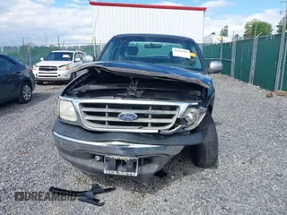 2003 Ford F-150 XL with VIN 1FTRX17223NB22897, listed as a IAAI auction lot 42166965 with 207,627 mi miles and . Bid and sale history available at DreamBid. Image 13.