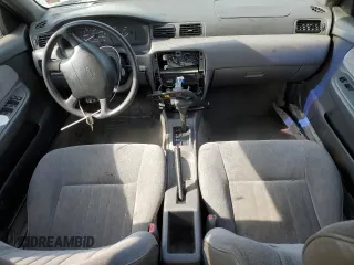 1996 Nissan Sentra XE z VIN 3N1AB41D5TL010573, wystawiony jako Copart lot #47284155 z przebiegiem 158 185 mil mil oraz Szkoda całkowita • Salvage title. Historia ofert i sprzedaży dostępna na DreamBid. Obrazek 8.