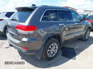 2014 Jeep Grand Cherokee Limited with VIN 1C4RJFBT0EC241030, listed as a IAAI auction lot 42617051 with 104,370 mi miles and . Bid and sale history available at DreamBid. Image 4.