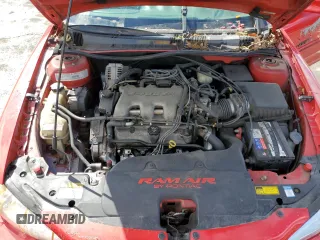 1999 Pontiac Grand Am GT1 with VIN 1G2NW52E5XM768638, listed as a Copart auction lot 49077115 with 113,018 mi miles and Salvage Title. Bid and sale history available at carsss.com. Image 12.