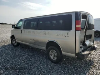 2004 Chevrolet Express Passenger with VIN 1GAHG39U741128458, listed as a Copart auction lot 64436215 with 118,387 mi miles and Salvage title. Bid and sale history available at DreamBid. Image 2.