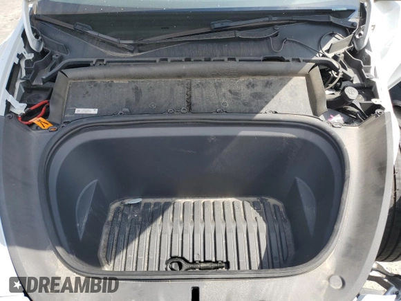 2023 Tesla Model Y Long Range z VIN 7SAYGDEE8PA030286, wystawiony jako Copart lot #50945465 z przebiegiem 43 676 mil mil oraz Szkoda całkowita • Salvage title. Historia ofert i sprzedaży dostępna na DreamBid. Obrazek 13.