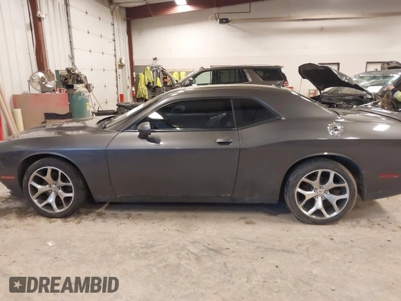 2016 Dodge Challenger SXT with VIN 2C3CDZAG7GH138288, listed as a IAAI auction lot 41128028 with 110,973 mi miles and . Bid and sale history available at DreamBid. Image 14.