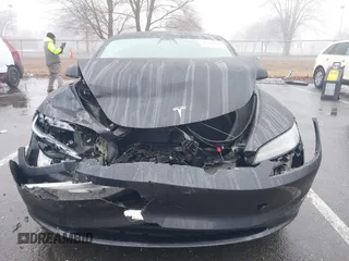 2024 Tesla Model 3 Long Range with VIN 5YJ3E1EB2RF815376, listed as a IAAI auction lot 41565549 with 10,377 mi miles and . Bid and sale history available at DreamBid. Image 6.