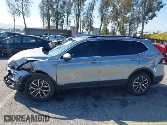 2021 Volkswagen Tiguan S with VIN 3VV1B7AX6MM131036, listed as a IAAI auction lot 41742604 with 55,155 mi miles and . Bid and sale history available at DreamBid. Image 15.