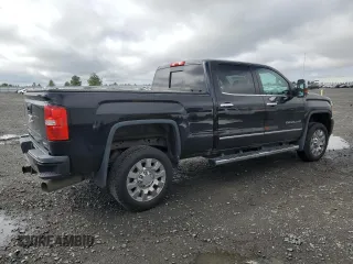 2017 GMC Sierra 2500HD Denali z VIN 1GT12UEY0HF114366, wystawiony jako Copart lot #54540275 z przebiegiem 78 066 mil mil oraz Szkoda całkowita • Salvage title. Historia ofert i sprzedaży dostępna na DreamBid. Obrazek 3.
