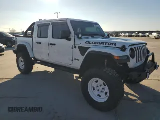 2022 Jeep Gladiator Rubicon with VIN 1C6JJTBG5NL152818, listed as a Copart auction lot 80095554 with 9,579 mi miles and Salvage title. Bid and sale history available at DreamBid. Image 4.