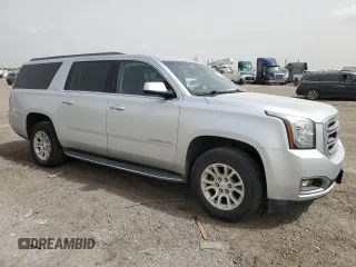 2019 GMC Yukon XL SLT with VIN 1GKS1GKC9KR288660, listed as a Copart auction lot 49669365 with 77,485 mi miles and Salvage Title. Bid and sale history available at carsss.com. Image 4.
