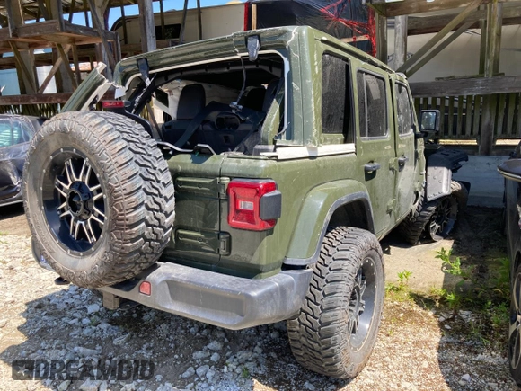 2024 Jeep Wrangler Sahara with VIN 1C4PJXEN8RW116985, listed as a Copart auction lot 56530875 with Not provided miles and Salvage title. Bid and sale history available at DreamBid. Image 4.