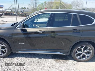 2018 BMW X1 xDrive28i with VIN WBXHT3C39J5F88234, listed as a IAAI auction lot 42044900 with 38,732 mi miles. Bid and sale history available at carsss.com. Image 14.