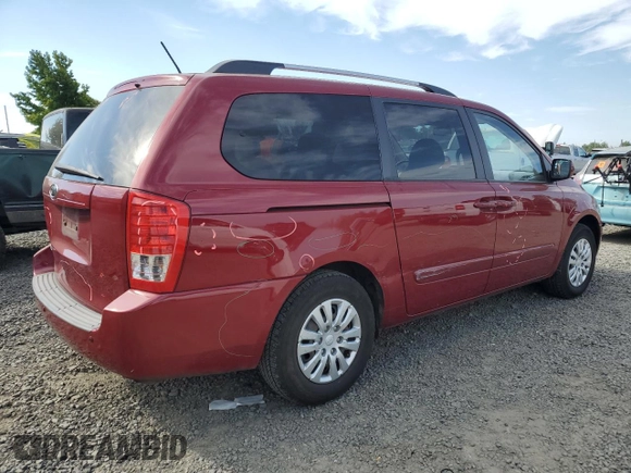 2011 Kia Sedona LX with VIN KNDMG4C72B6369858, listed as a Copart auction lot 70339124 with 165,640 mi miles and Salvage Title. Bid and sale history available at carsss.com. Image 3.