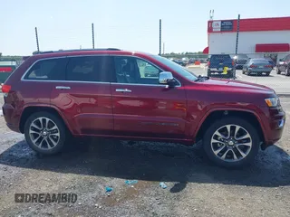 2017 Jeep Grand Cherokee Overland with VIN 1C4RJFCG7HC658943, listed as a IAAI auction lot 42282213 with 103,291 mi miles and . Bid and sale history available at DreamBid. Image 13.