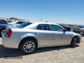 2007 Chrysler 300 with VIN 2C3KA43RX7H664582, listed as a IAAI auction lot 42106297 with 141,866 mi miles and . Bid and sale history available at DreamBid. Image 13.