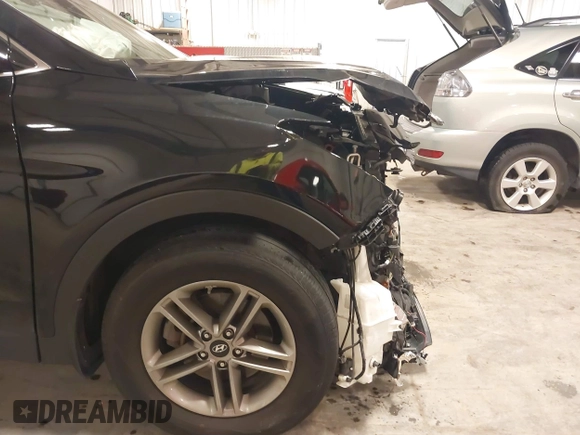 2017 Hyundai Santa Fe 2.4L with VIN 5NMZUDLBXHH041621, listed as a IAAI auction lot 42194586 with 91,012 mi miles and . Bid and sale history available at DreamBid. Image 19.