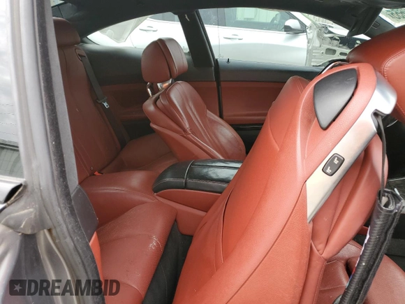 2013 BMW 6 Series 650i xDrive z VIN WBAYM1C53DDZ02397, wystawiony jako Copart lot #48872655 z przebiegiem Nie podano mil oraz Szkoda całkowita • Salvage title. Historia ofert i sprzedaży dostępna na DreamBid. Obrazek 10.