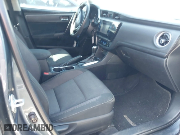 2019 Toyota Corolla L with VIN 2T1BURHE4KC134729, listed as a IAAI auction lot 41779629 with 240,685 mi miles. Bid and sale history available at carsss.com. Image 5.