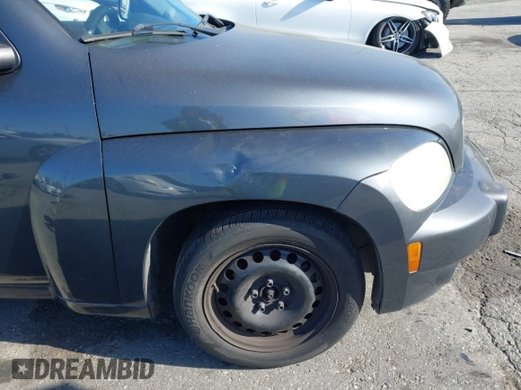 2011 Chevrolet HHR LS z VIN 3GNBAAFW2BS658431, wystawiony jako IAAI lot #41998908 z przebiegiem 218 334 mil mil oraz . Historia ofert i sprzedaży dostępna na DreamBid. Obrazek 14.