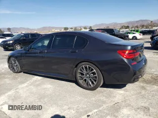 2019 BMW 7 Series 750i with VIN WBA7F0C56KGM25430, listed as a Copart auction lot 42048135 with 74,717 mi miles and Salvage title. Bid and sale history available at DreamBid. Image 2.