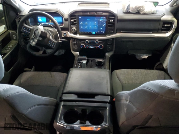 2023 Ford F-150 Lightning Pro z VIN 1FT6W1EV3PWG34249, wystawiony jako Copart lot #46901535 z przebiegiem 9 389 mil mil oraz Szkoda całkowita • Salvage title. Historia ofert i sprzedaży dostępna na DreamBid. Obrazek 8.