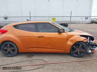 2015 Hyundai Veloster RE:FLEX with VIN KMHTC6AD8FU238345, listed as a IAAI auction lot 41549377 with 117,240 mi miles. Bid and sale history available at carsss.com. Image 14.