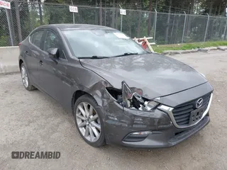 2017 Mazda 3 Touring with VIN 3MZBN1V73HM118104, listed as a IAAI auction lot 42139361 with 71,615 mi miles and . Bid and sale history available at DreamBid. Image 1.