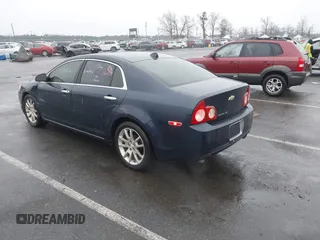 2012 Chevrolet Malibu LTZ with VIN 1G1ZG5E78CF234290, listed as a IAAI auction lot 41482158 with 113,476 mi miles and . Bid and sale history available at DreamBid. Image 3.